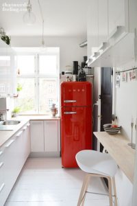 A Cherry Red Fridge Is The Focal Point