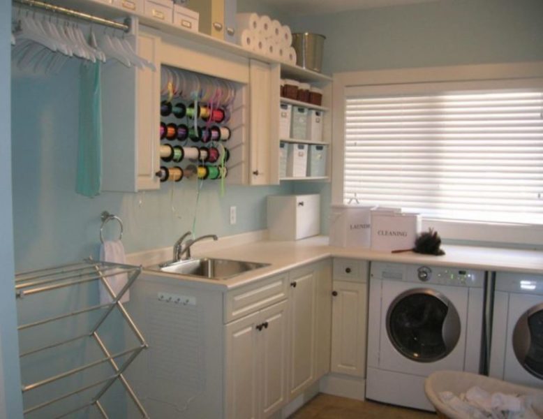basement laundry room with sink